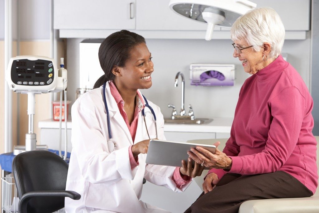 Elderly woman seeing a doctor