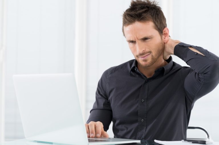 man feeling stressed at work