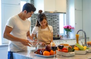 couple preparing food in the kitchen