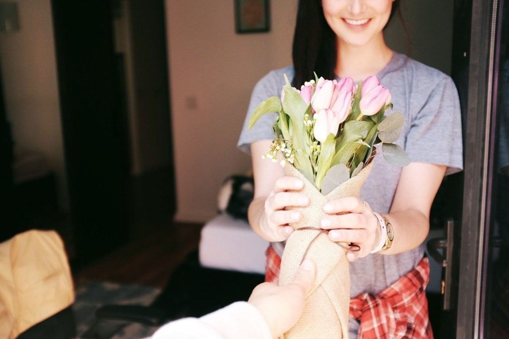 girl receiving flowers