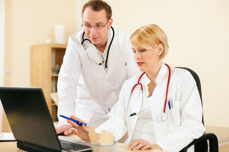 doctors with laptop