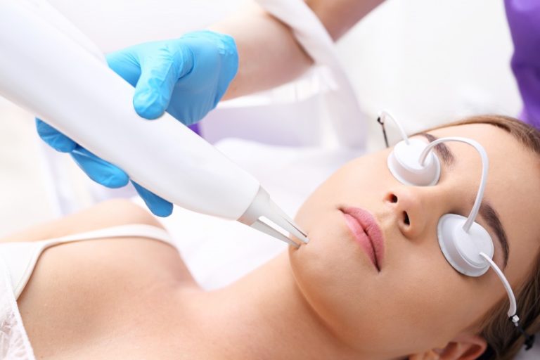 woman having face treatment