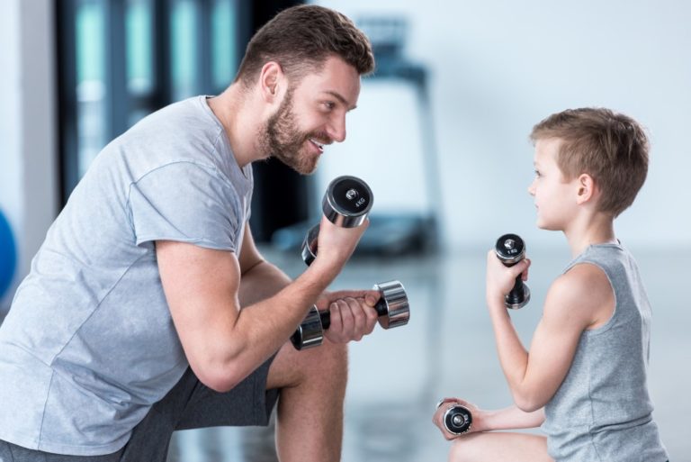 father and son exercising