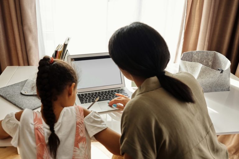 kid studying with parent