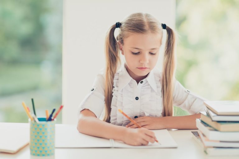 young girl studying