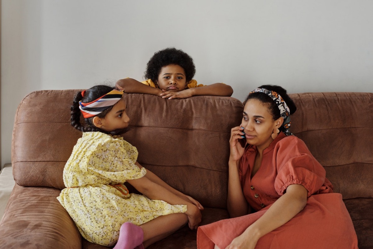 woman talking with her children