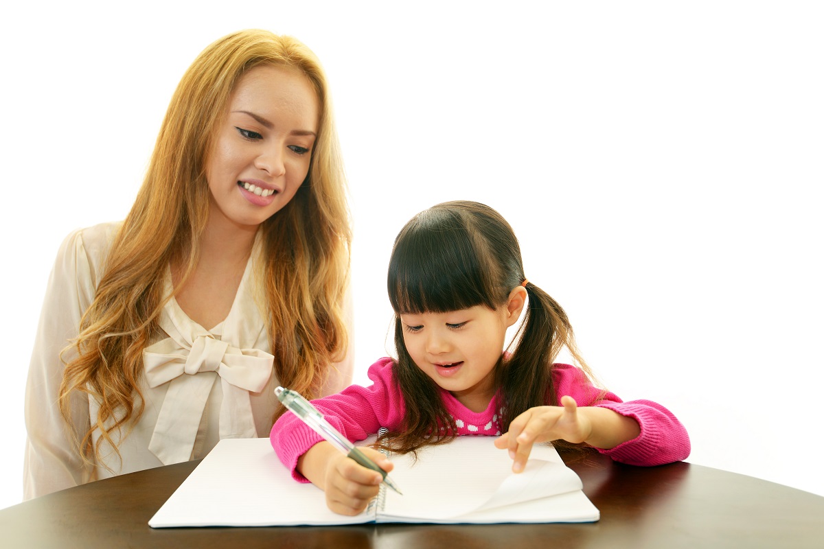 mother teaching child