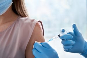 woman getting covid 19 vaccine