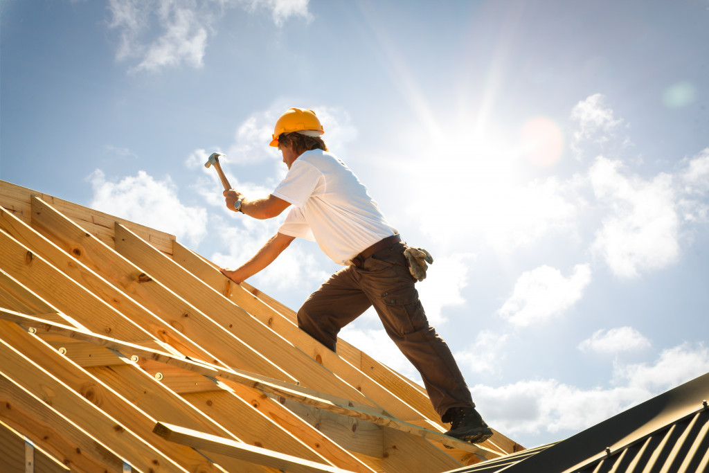 A man working on a new home roof