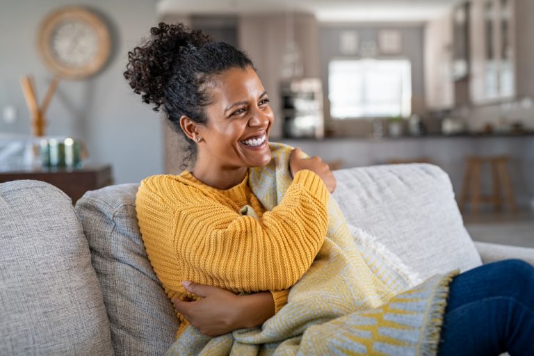 woman hugging herself