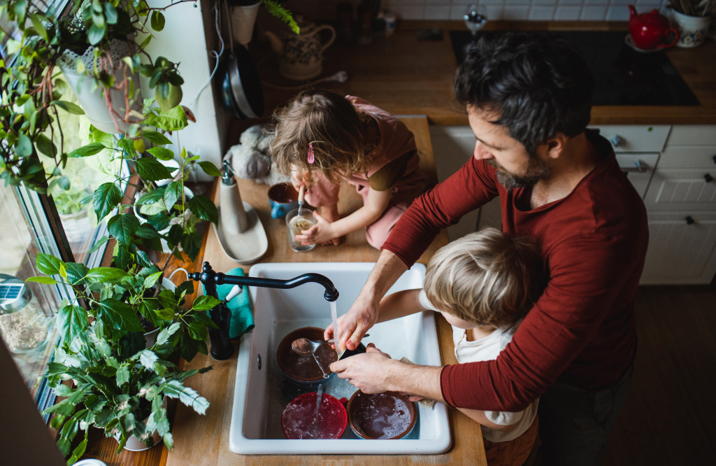 Family maintaining a clean home