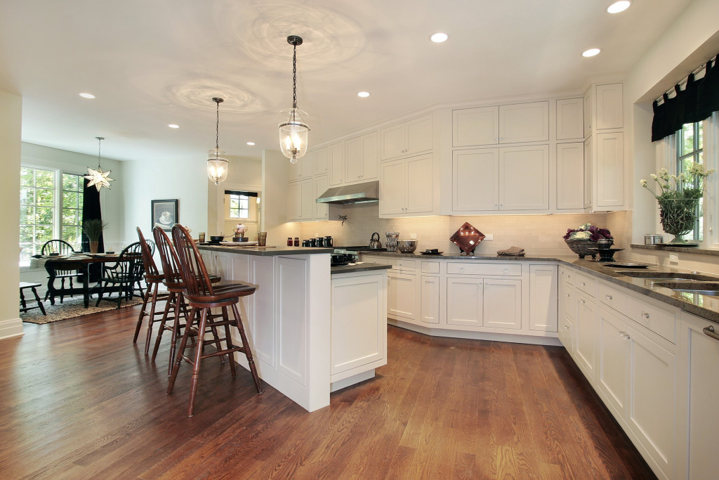 Kitchen of a home with ceiling lighting fixtures.