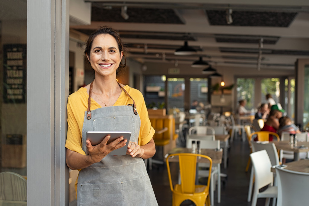 Restaurant owner with tab