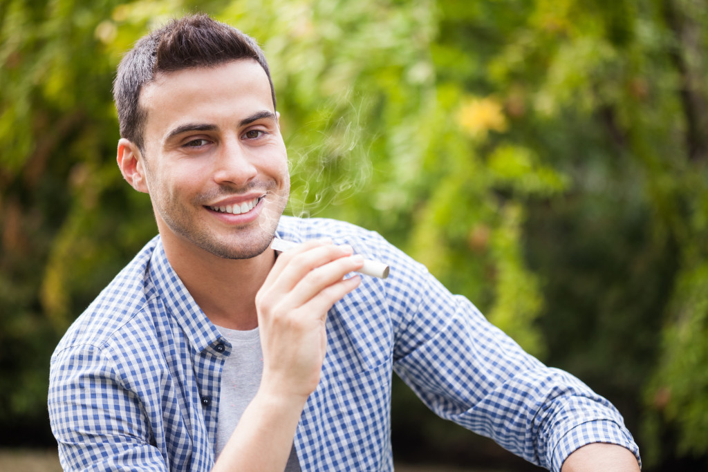 Man smoking outdoors