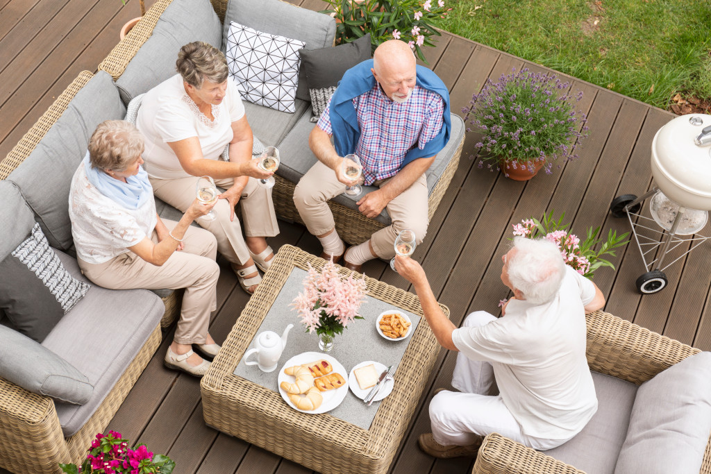 senior family members at the deck of the house