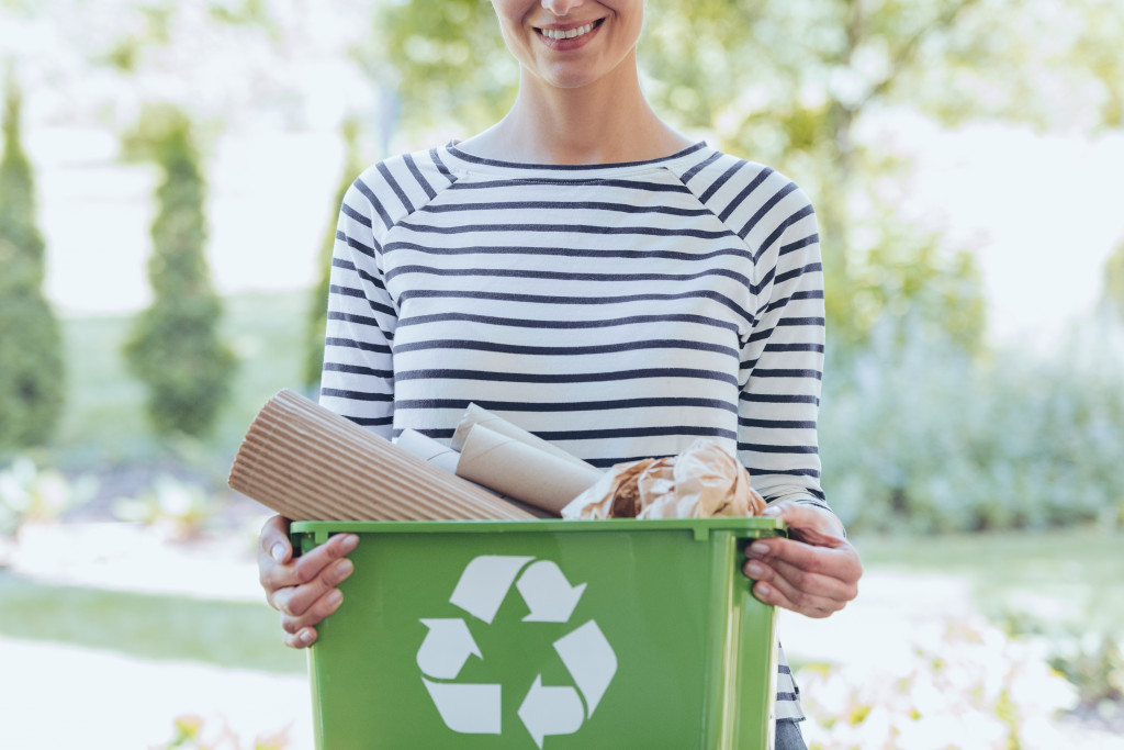 putting it into green container