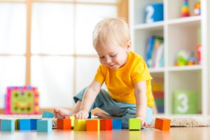 boy child playing blocks