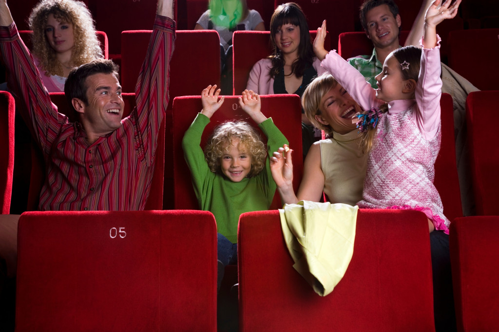 a family in the movie theater